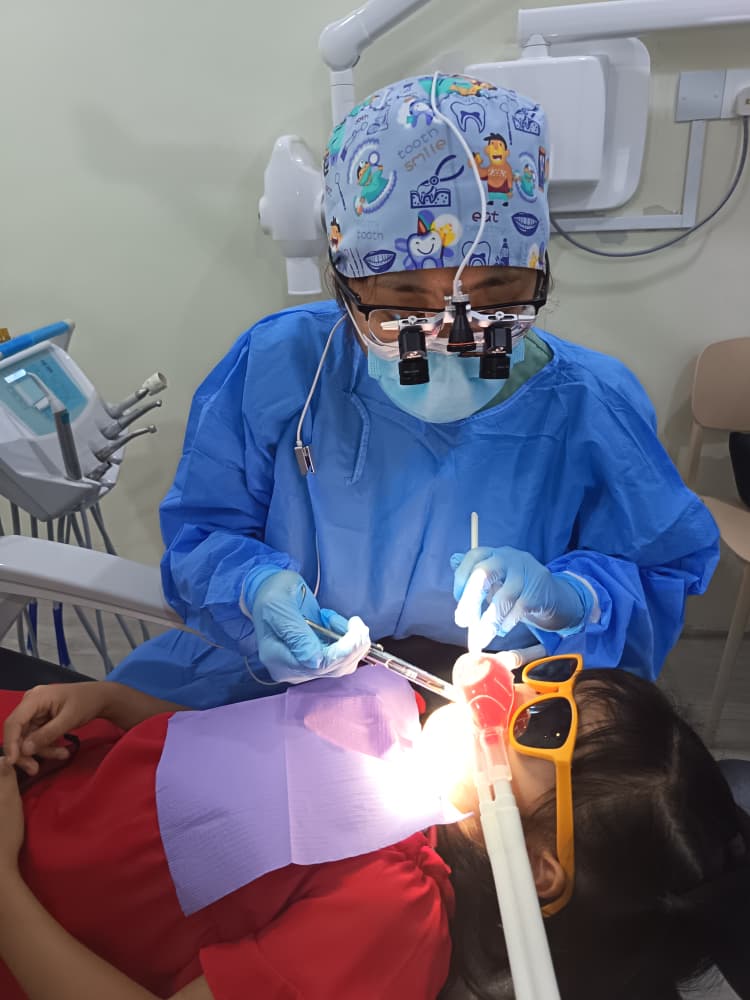 Child staying relaxed during dental treatment with nitrous oxide sedation